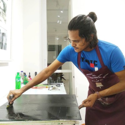 Rafiqul Islam working in his studio.